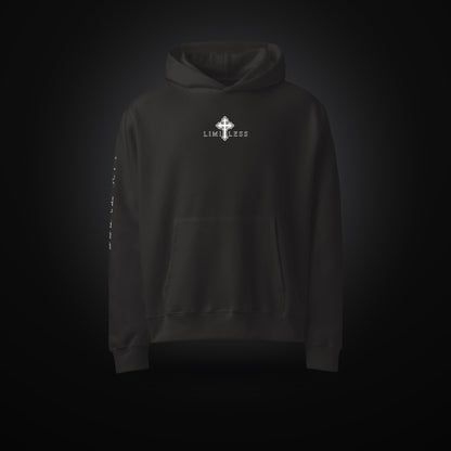LIMITLESS oversized heavyweight hoodie in black, front view with embroidered cross logo